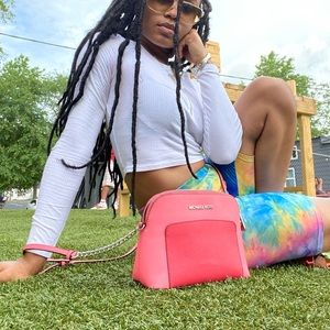 Pink cross body bag micheal Kors